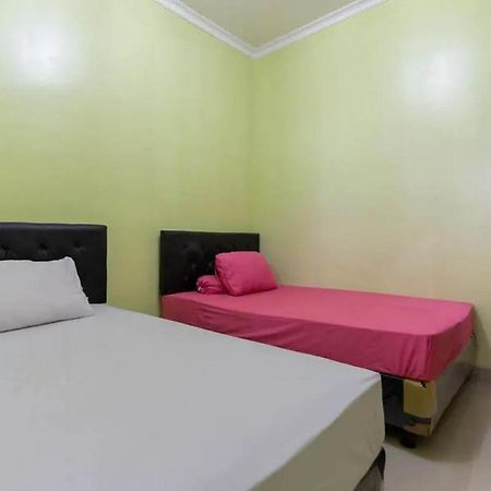 Hotel Kostawira Syariah Bintaro Mitra Reddoorz à Mencil Extérieur photo