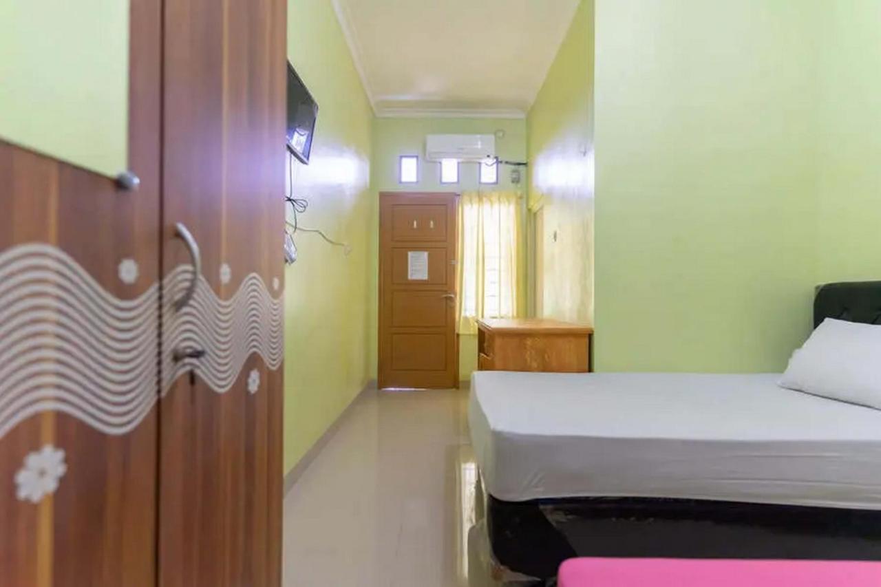 Hotel Kostawira Syariah Bintaro Mitra Reddoorz à Mencil Extérieur photo