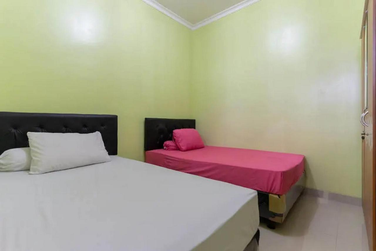 Hotel Kostawira Syariah Bintaro Mitra Reddoorz à Mencil Extérieur photo