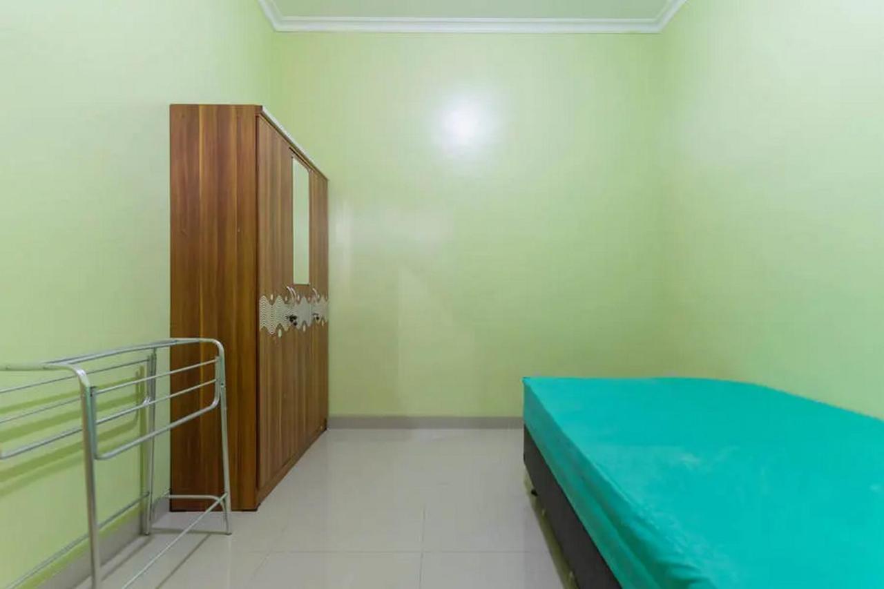 Hotel Kostawira Syariah Bintaro Mitra Reddoorz à Mencil Extérieur photo