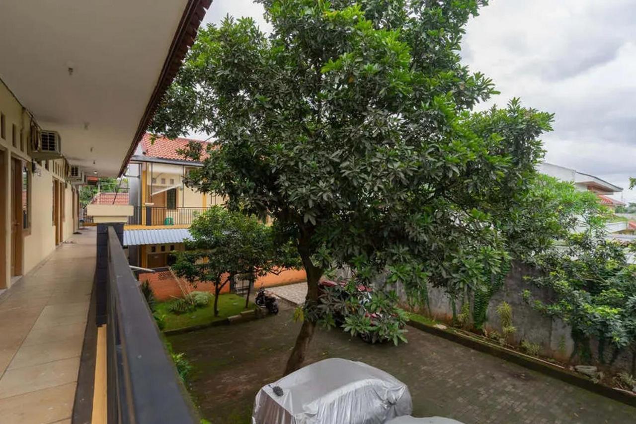 Hotel Kostawira Syariah Bintaro Mitra Reddoorz à Mencil Extérieur photo