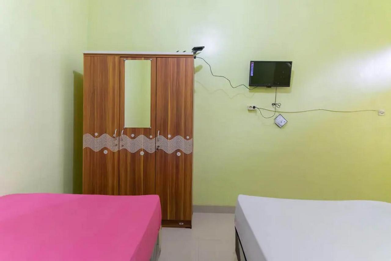 Hotel Kostawira Syariah Bintaro Mitra Reddoorz à Mencil Extérieur photo