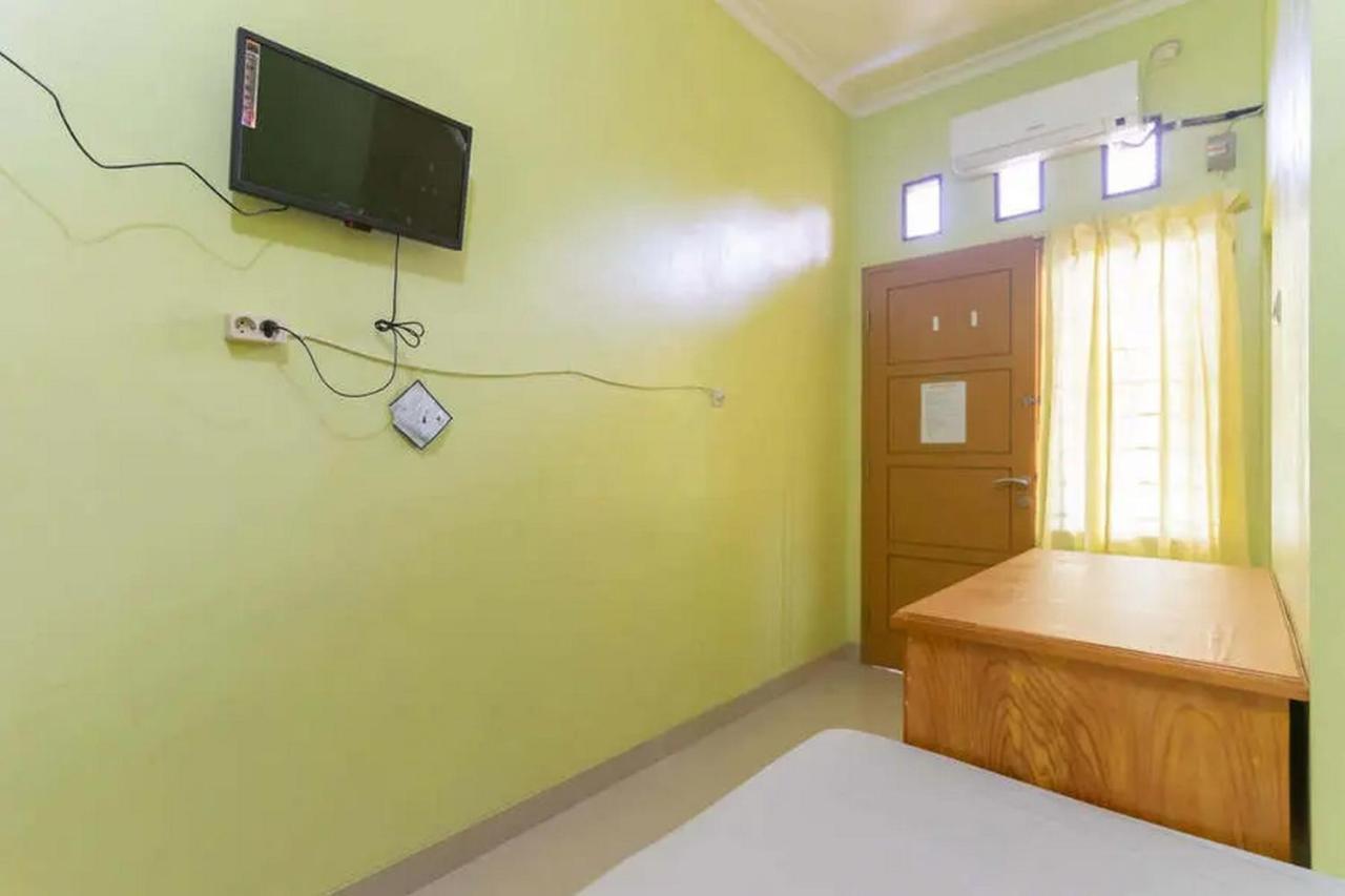 Hotel Kostawira Syariah Bintaro Mitra Reddoorz à Mencil Extérieur photo