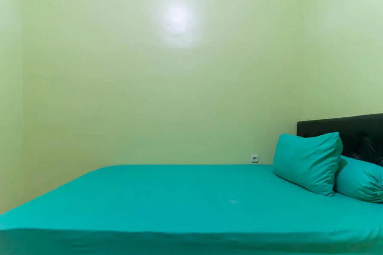 Hotel Kostawira Syariah Bintaro Mitra Reddoorz à Mencil Extérieur photo